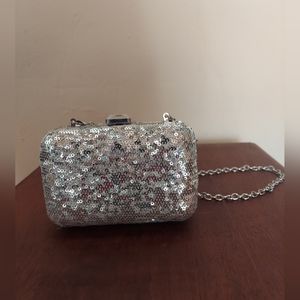 Sparkly silver clutch bag
